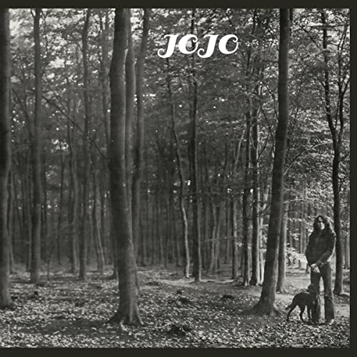 Black and white CD cover featuring a man and dog in a forest.
