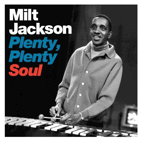 "Milt Jackson album cover with man playing vibraphone, black and white photo."