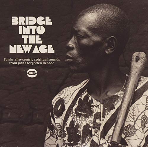 CD cover featuring a portrait of a Black man with a musical instrument.