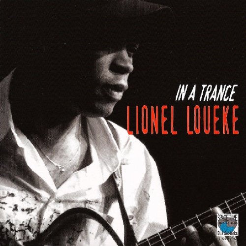 "Album cover with black and white photo of man playing guitar and hat."