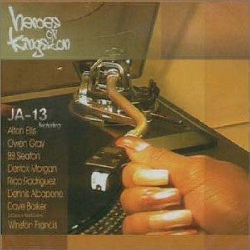 "Album cover with hand holding vinyl record on a record player."