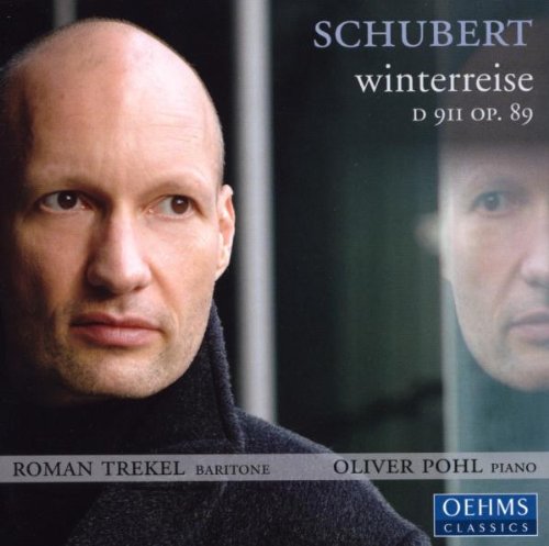 "Album cover featuring a bald man in a black turtleneck, with a blurred reflection."