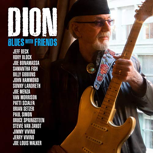 "Album cover with Dion holding a guitar, featuring a list of collaborating artists."