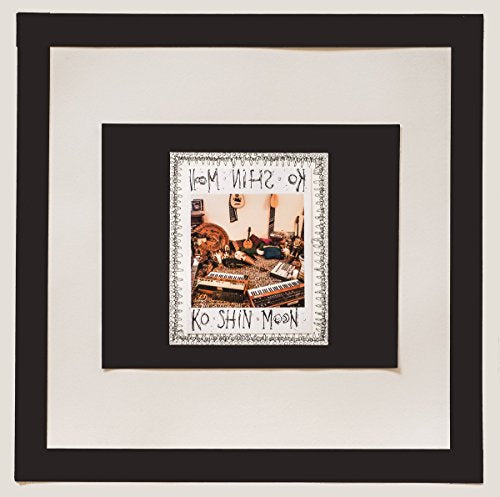 CD cover in a black frame with a sketched, colorful studio scene.