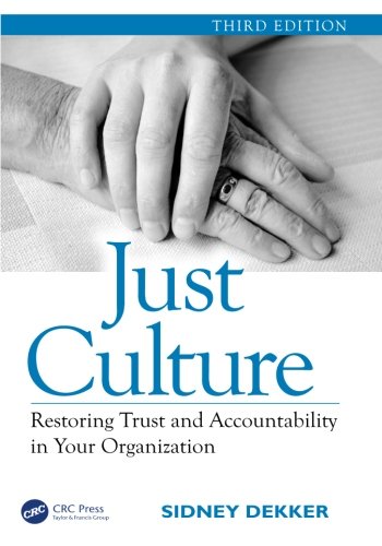 Book cover with black and white image of hands and blue title "Just Culture".