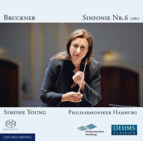 CD cover featuring a woman conductor holding a baton, with text and logos.
