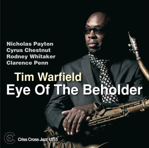 "Album cover with Tim Warfield holding a saxophone against a black background."