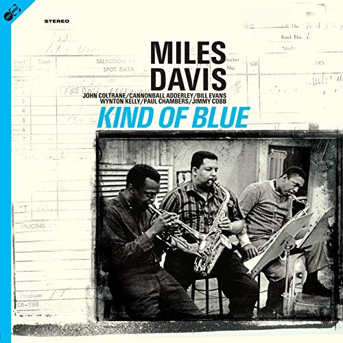 "Album cover with black and white photo of three musicians playing instruments."