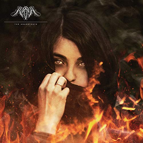 Close-up of a woman’s face partially obscured by smoke and flames.