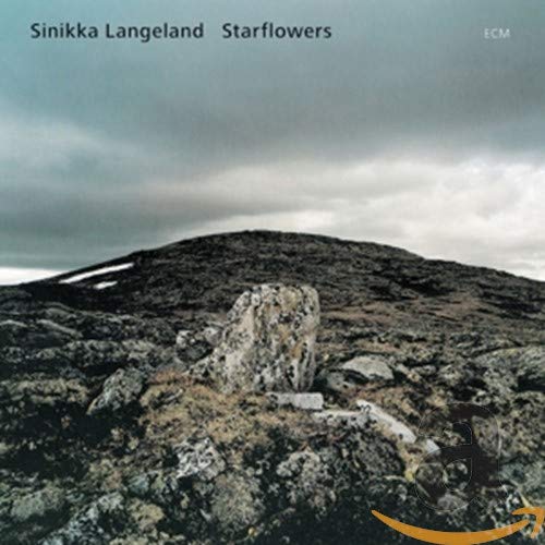 CD cover for Sinikka Langeland’s “Starflowers” featuring a rocky landscape.