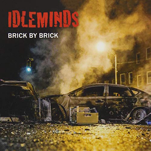 CD cover for Idleminds’ “Brick By Brick” featuring a burning car.