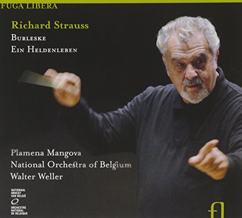"CD cover featuring a conductor with baton against a black background."