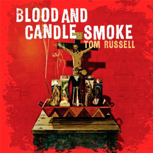 "Tom Russell album cover with crucified skeleton and red background."