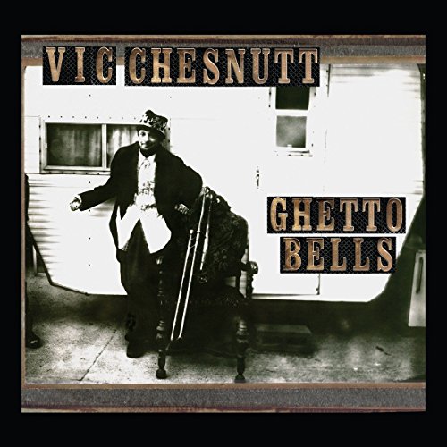 "Vic Chesnutt's 'Ghetto Bells' vinyl album cover featuring a man in a suit."