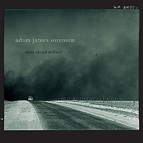 "Album cover with a car driving down a dusty road under a dark sky."