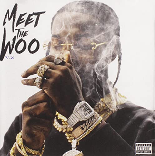 Pop Smoke album cover: portrait of rapper with jewelry and smoke.