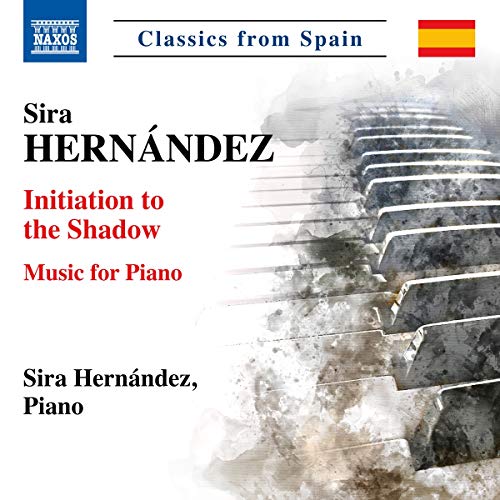 A CD cover featuring piano keys with a white, gray, and black design.