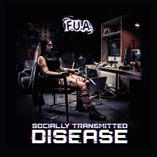 Album cover featuring a woman surrounded by electronic equipment in a dark room.
