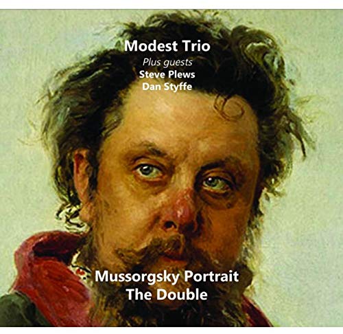"CD cover featuring a portrait of a man with a red cloak."