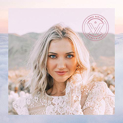 Sarah Darling album cover, portrait of a blonde woman with mountains.