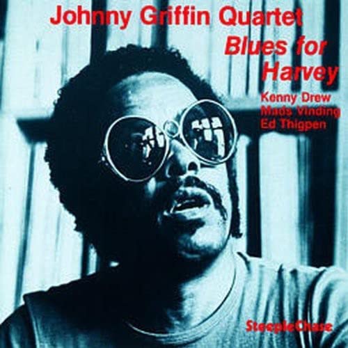 CD cover featuring Johnny Griffin with round sunglasses, red text.