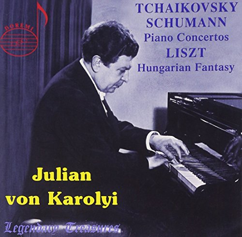 Black and white photo of pianist Julian von Karolyi playing a grand piano.
