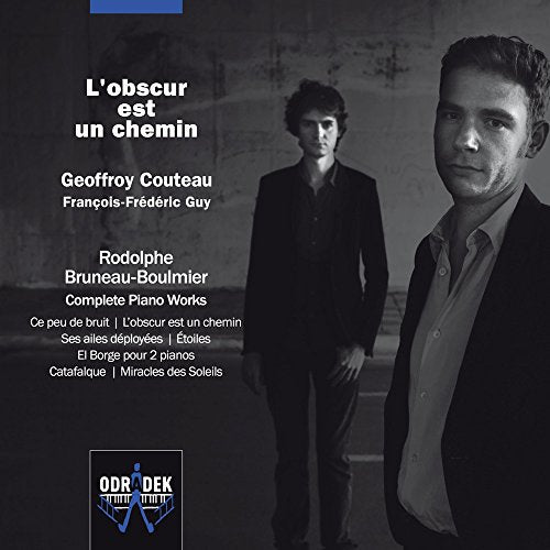 "CD cover featuring two men in dark attire against a gray background."