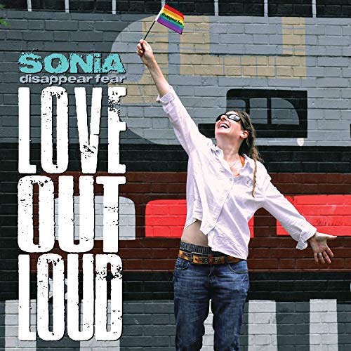 CD cover featuring Sonia, rainbow flag, and bold text on a brick wall.