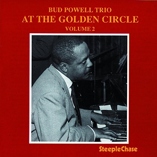Red album cover with black-and-white photo of man playing piano, titled "Bud Powell Trio".