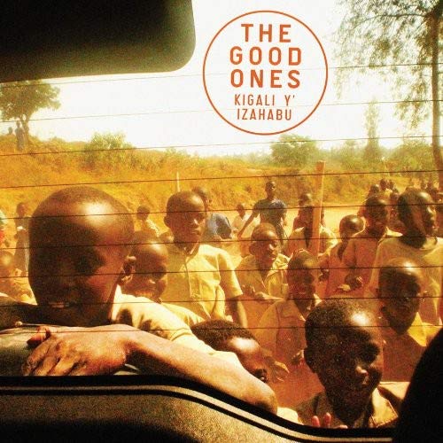 Vinyl album cover featuring a crowd of people seen through a window.