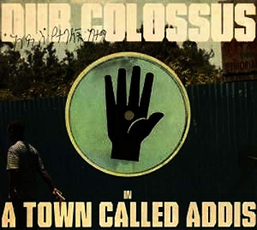 CD cover for Dub Colossus’ “In A Town Called Addis” with a hand icon.