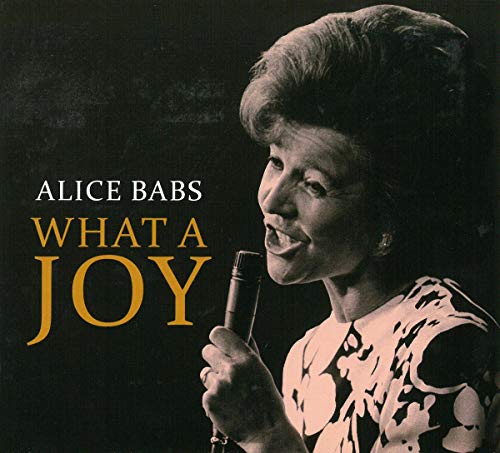"Album cover featuring a black and white photo of Alice Babs singing into a microphone."