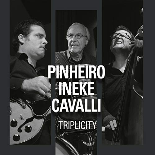 "Album cover with three black-and-white musician photos and white text on dark background."