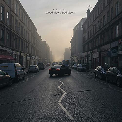 Album cover: a misty city street with cars, titled "Good News / Bad News".