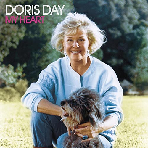 Doris Day with a small, dark dog, album cover for "My Heart".