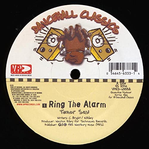 Vinyl record label for Tenor Saw’s “Ring The Alarm,” with illustrated graphics.