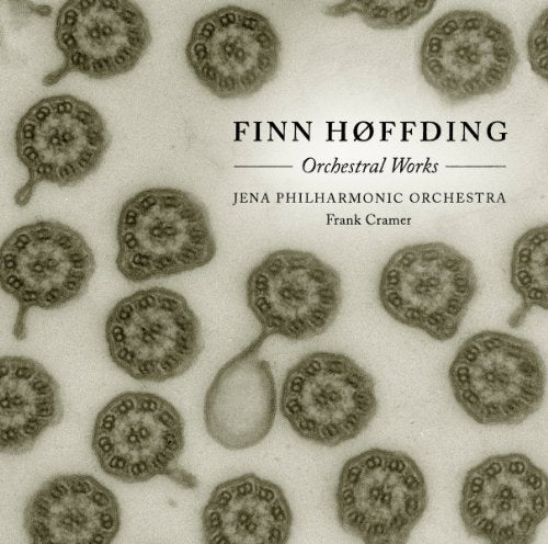 CD cover with repeating microscopic cell-like shapes and text details.