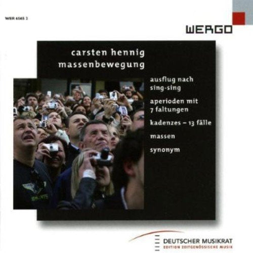"CD cover with a crowd of people holding up cameras, on a black background."