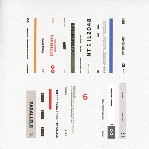 "CD case with white background and multiple colored labels and barcodes."