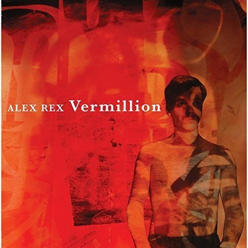 Red vinyl record cover with a man in a cap and abstract background.