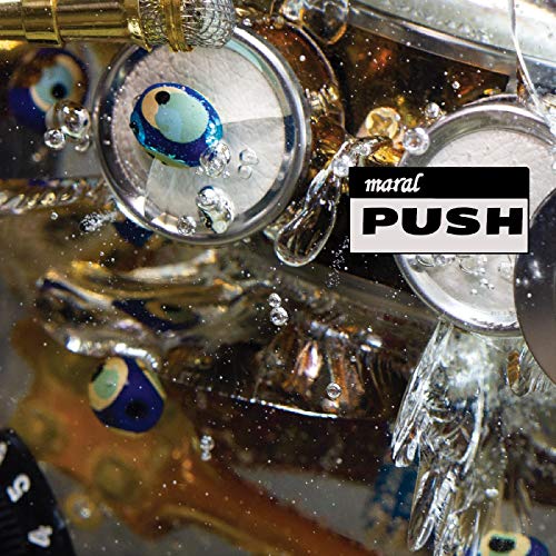 Vinyl record cover with water, microphones, and blue evil eye charms.