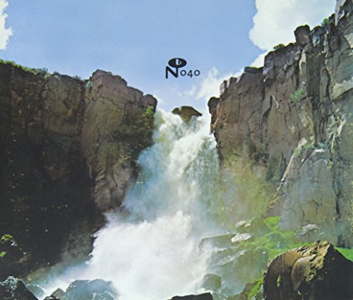 CD cover with a waterfall cascading between rocky cliffs under a blue sky.