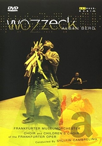 DVD cover featuring a man holding sticks, with another man playing a drum behind.