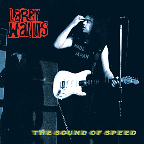 Vinyl album cover featuring a man playing a white electric guitar on stage.