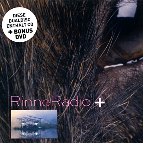 "CD cover with 'RinneRadio +' text, featuring close-up of reeds and a small inset image."