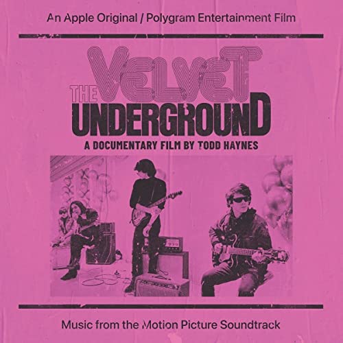 Pink vinyl record cover featuring The Velvet Underground band members playing guitars.