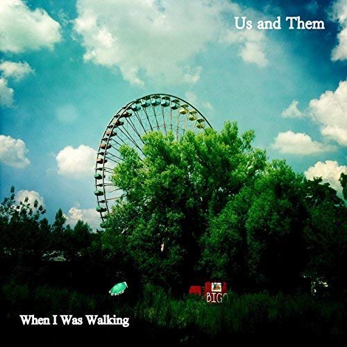 Album cover: Ferris wheel and trees under a cloudy sky.