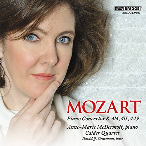 CD cover featuring a woman with blue eyes, titled "Mozart Piano Concertos".