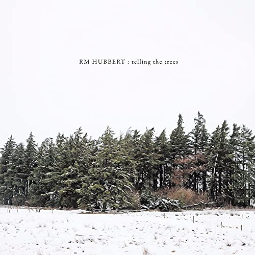 Album cover for "Telling The Trees" with a snowy forest landscape.