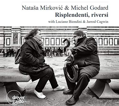 "Black and white CD cover with two men sitting on benches, facing each other."